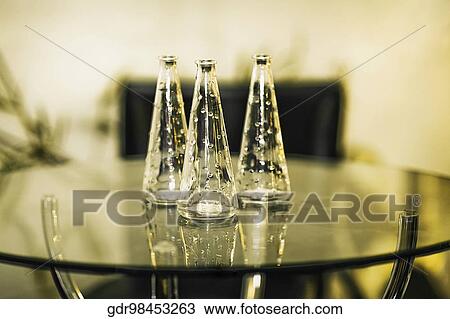 Three vases on a table View Large Photo Image Stock Image - Three vases on a table. Fotosearch