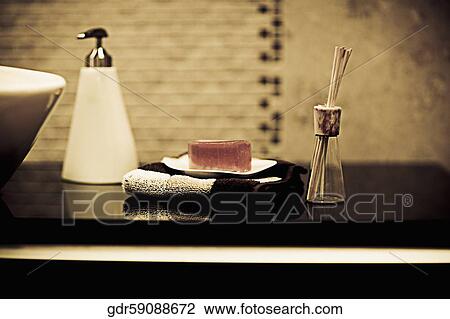 Stock Image - Toiletries near a wash bowl. Fotosearch