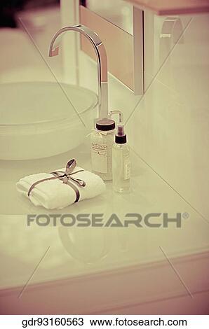Toiletries near a wash bowl View Large Photo Image Stock Image - Toiletries near a wash bowl. Fotosearch