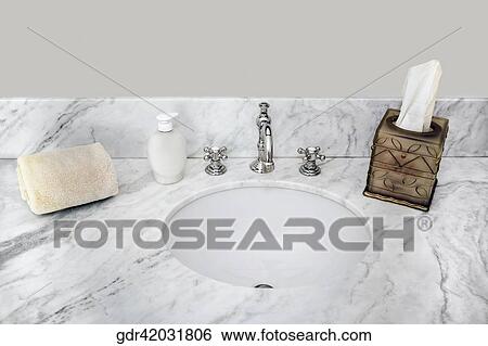 Toiletries near a wash bowl View Large Photo Image Stock Photograph - Toiletries near a wash bowl. Fotosearch
