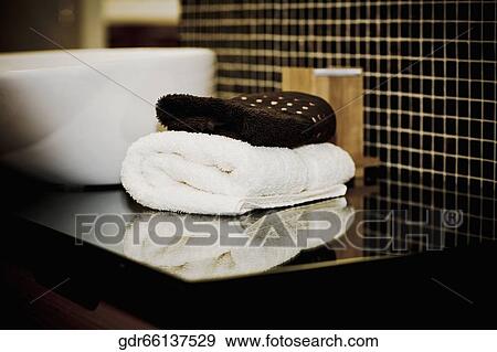 Stock Photo - Towels near a wash bowl. Fotosearch