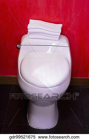 Towels on a toilet bowl View Large Photo Image Stock Photography - Towels on a toilet bowl. Fotosearch