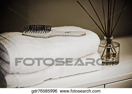 Towels with a hairbrush View Large Photo Image Stock Photograph - Towels with a hairbrush. Fotosearch