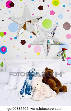 Toys in a bed View Large Photo Image Picture - Toys in a bed. Fotosearch