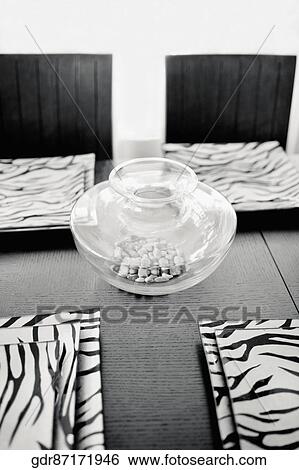 Trays and showpiece on a dining table View Large Photo Image Stock Photograph - Trays and showpiece on a dining table. Fotosearch