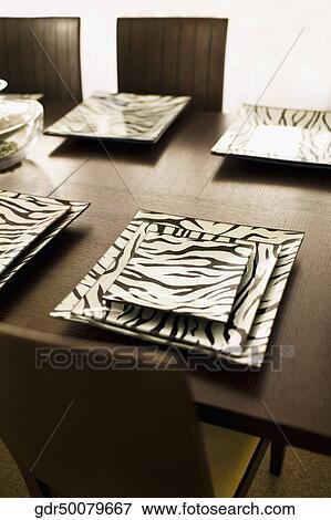 Trays on a dining table View Large Photo Image Stock Photo - Trays on a dining table. Fotosearch