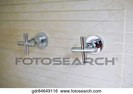 Stock Photograph - Two knobs in the bathroom. Fotosearch