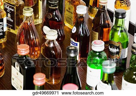 Varieties of alcoholic bottles View Large Photo Image Stock Image - Varieties of alcoholic bottles. Fotosearch