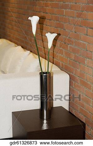 Vase on a side table View Large Photo Image Stock Image - Vase on a side table. Fotosearch
