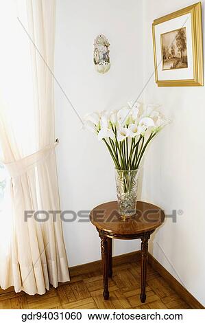 Vase on a stool View Large Photo Image Stock Image - Vase on a stool. Fotosearch