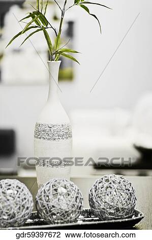 Vase with decorative balls in a tray View Large Photo Image Stock Image - Vase with decorative balls in a tray. Fotosearch