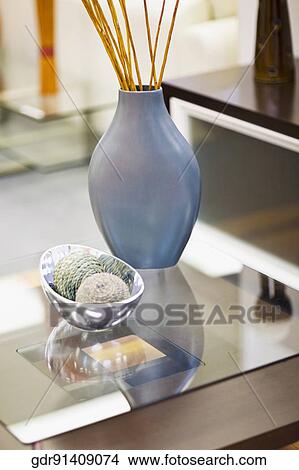 Vase with decorative balls on a table View Large Photo Image Picture - Vase with decorative balls on a table. Fotosearch