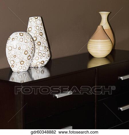 Vases on a chest View Large Photo Image Stock Image - Vases on a chest. Fotosearch