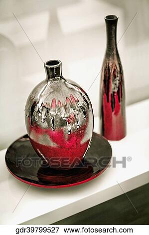Vases on a rack View Large Photo Image Stock Photo - Vases on a rack. Fotosearch
