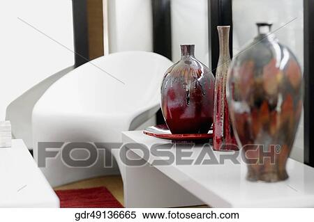 Vases on a rack View Large Photo Image Stock Photography - Vases on a rack. Fotosearch