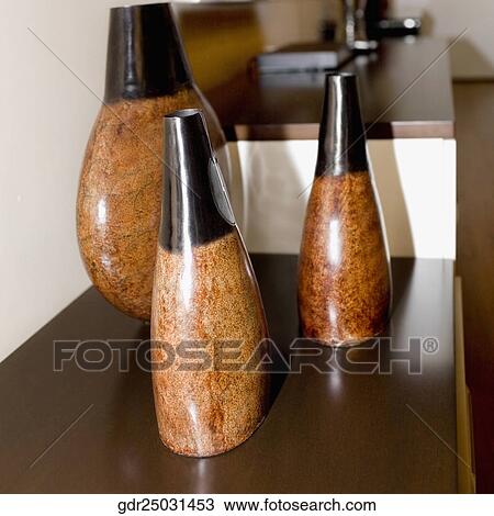 Vases on a sideboard View Large Photo Image Stock Image - Vases on a sideboard. Fotosearch