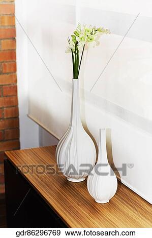 Vases on a sideboard View Large Photo Image Stock Photo - Vases on a sideboard. Fotosearch