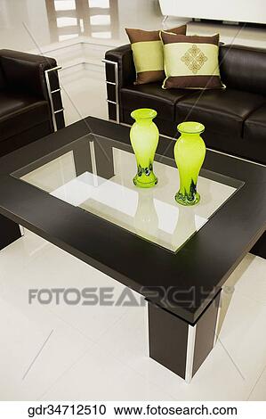 Vases on a table in a living room View Large Photo Image Stock Image - Vases on a table in a living room. Fotosearch