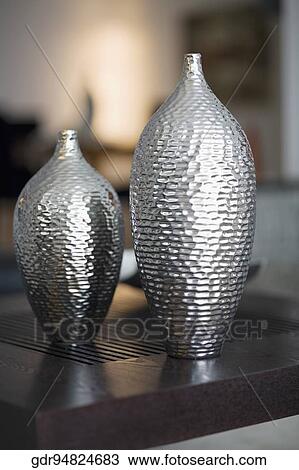 Stock Image - Vases on a table. Fotosearch