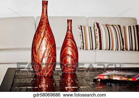 Vases on a table View Large Photo Image Stock Photograph - Vases on a table. Fotosearch