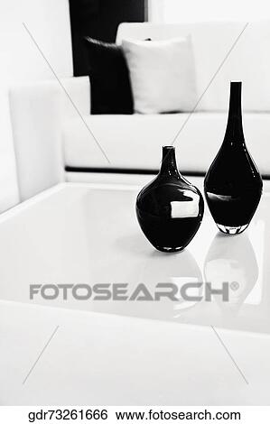 Vases on a table View Large Photo Image Stock Photograph - Vases on a table. Fotosearch
