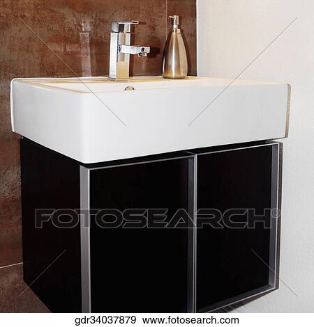 Stock Photo - Wash basin in the bathroom. Fotosearch