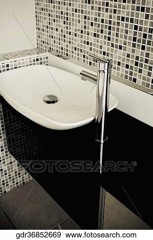 Stock Photo - Wash basin in the bathroom. Fotosearch