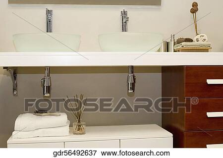 Wash Bowls On A Cabinet In The Bathroom Stock Photo Gdr56492637 Wash Bowls On A Cabinet In The Bathroom