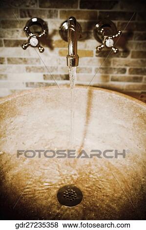 Stock Photo - Washbasin in the bathroom. Fotosearch