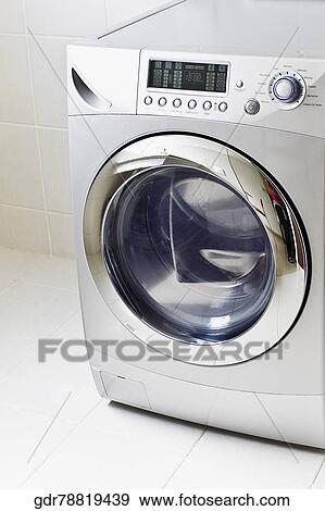 Washing machine in the bathroom View Large Photo Image Stock Photo - Washing machine in the bathroom. Fotosearch