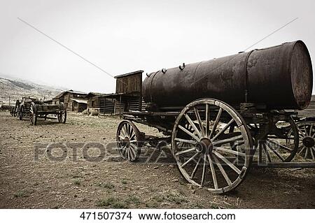Abandoned horse carts in a field, Old Trail Town, Cody, Wyoming, USA View Large Photo Image Picture - Abandoned horse carts in a field, Old Trail Town, Cody, Wyoming, USA. Fotosearch