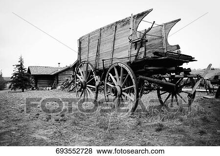 Abandoned horse carts in a grassy field, Old Trail Town, Cody, Wyoming, USA View Large Photo Image Stock Photo - Abandoned horse carts in a grassy field, Old Trail Town, Cody, Wyoming, USA. Fotosearch