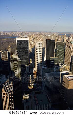 Aerial view of skyscrapers in a city, Manhattan, New York City, New York State, USA View Large Photo Image Picture - Aerial view of skyscrapers in a city, Manhattan, New York City, New York State, USA. Fotosearch