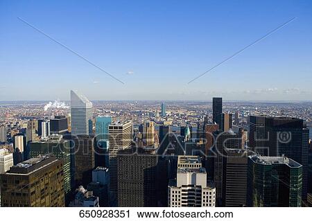 Aerial view of skyscrapers in a city, Manhattan, New York City, New York State, USA View Large Photo Image Stock Image - Aerial view of skyscrapers in a city, Manhattan, New York City, New York State, USA. Fotosearch