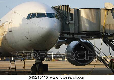 Airplane with boarding stairs, Paris, Ile-de-France, France View Large Photo Image Stock Photography - Airplane with boarding stairs, Paris, Ile-de-France, France. Fotosearch