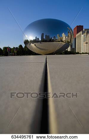 Stock Image - Bean sculpture at a Town square, The Bean, Cloud Gate, Millennium Park, Chicago, Illinois, USA. Fotosearch