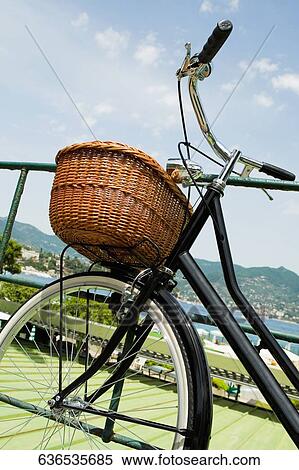 Bicycle leaning against a railing, Italian Riviera, Santa Margherita Ligure, Genoa, Liguria, Italy View Large Photo Image Stock Photography - Bicycle leaning against a railing, Italian Riviera, Santa Margherita Ligure, Genoa, Liguria, Italy. Fotosearch