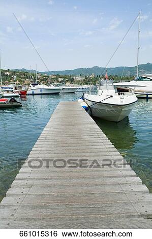 Stock Photograph - Boats moored at a harbor, Italian Riviera, Santa Margherita Ligure, Genoa, Liguria, Italy. Fotosearch