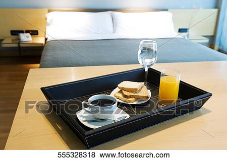 Breakfast tray on a table View Large Photo Image Stock Photo - Breakfast tray on a table. Fotosearch