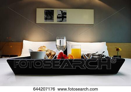 Breakfast tray on the bed View Large Photo Image Stock Photograph - Breakfast tray on the bed. Fotosearch