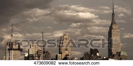 Buildings in a city, Empire State Building, Manhattan, New York City, New York State, USA View Large Photo Image Stock Image - Buildings in a city, Empire State Building, Manhattan, New York City, New York State, USA. Fotosearch