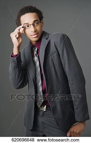 Stock Photo - Businessman wearing eyeglasses. Fotosearch