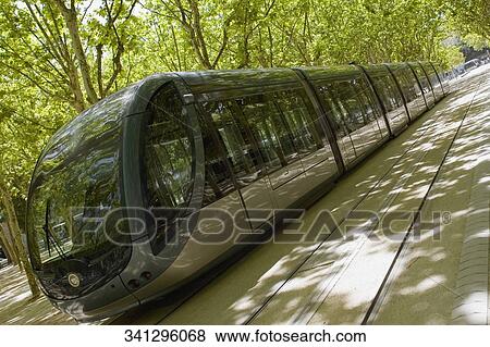 Cable car moving on a tramway, Bordeaux, Aquitaine, France View Large Photo Image Stock Photo - Cable car moving on a tramway, Bordeaux, Aquitaine, France. Fotosearch