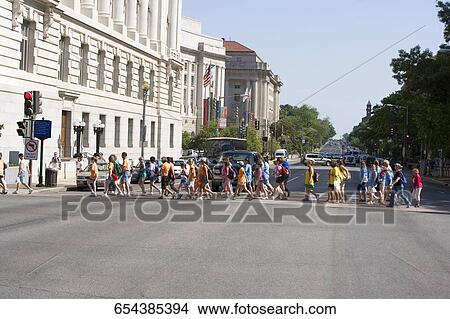 Children crossing the road at a crosswalk, Pennsylvania Avenue, Washington DC, USA View Large Photo Image Picture - Children crossing the road at a crosswalk, Pennsylvania Avenue, Washington DC, USA. Fotosearch