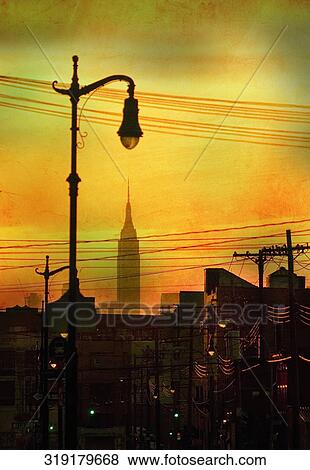 Cityscape at dusk, Empire State Building, Manhattan, New York City, New York State, USA View Large Photo Image Stock Photo - Cityscape at dusk, Empire State Building, Manhattan, New York City, New York State, USA. Fotosearch