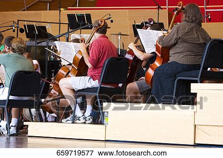 Classic concert in a auditorium, Millennium Park, Chicago, Illinois, USA View Large Photo Image Stock Photo - Classic concert in a auditorium, Millennium Park, Chicago, Illinois, USA. Fotosearch