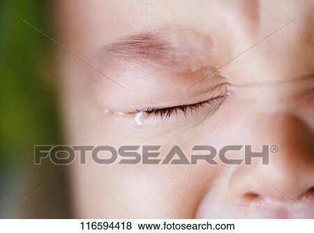 Close-up of a baby girl crying View Large Photo Image Stock Photo - Close-up of a baby girl crying. Fotosearch