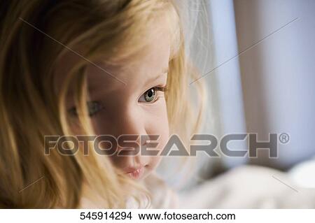 Close-up of a baby girl View Large Photo Image Picture - Close-up of a baby girl. Fotosearch