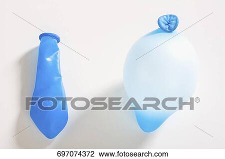 Stock Image - Close-up of a balloon with a deflated balloon. Fotosearch
