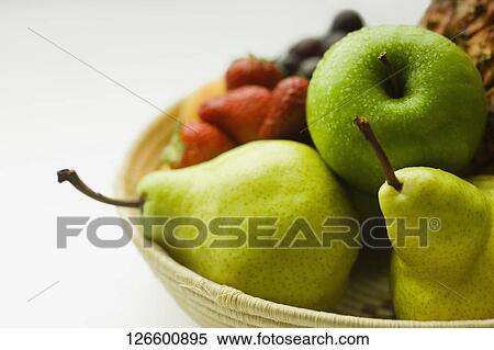 Close-up of a basket of fruits View Large Photo Image Stock Photography - Close-up of a basket of fruits. Fotosearch
